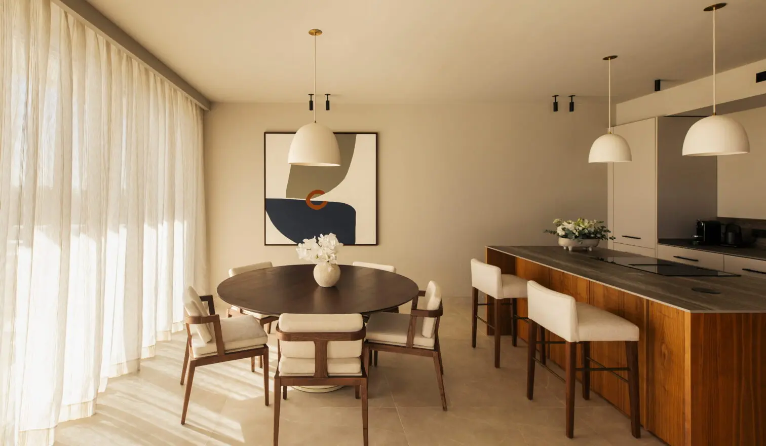 Fully furnished kitchen and dining area at Fairmont Residences La Hacienda