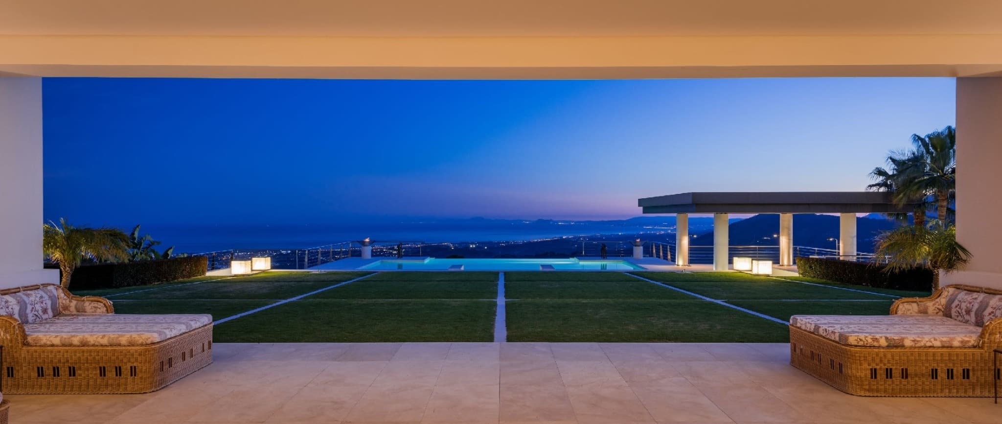 Twilight panoramic view from a luxury Marbella villa terrace